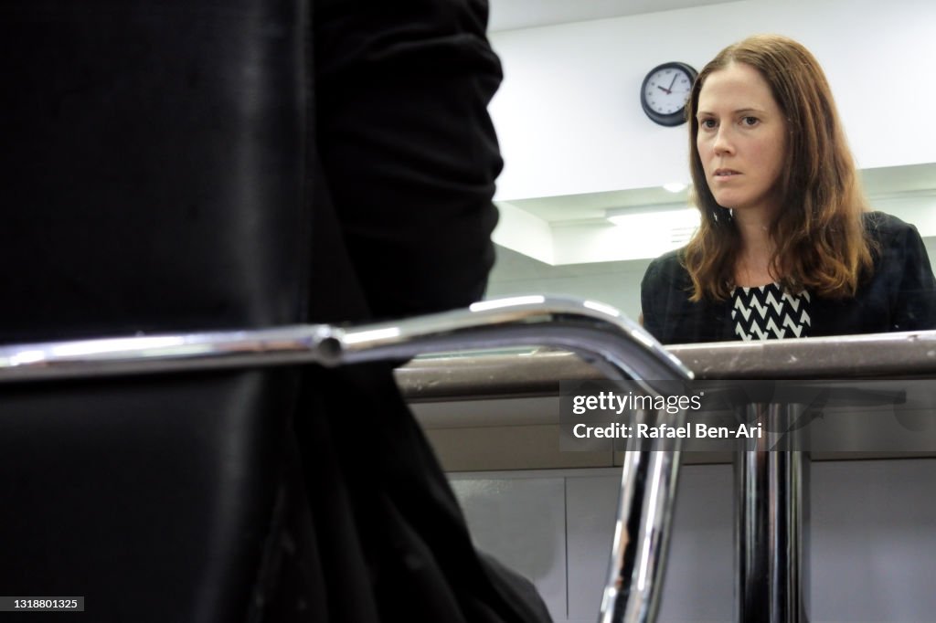 Female psychologist consulting with an unrecognisable person