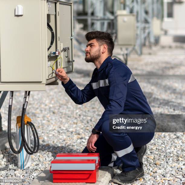 electrician working with work tool - distribution board stock pictures, royalty-free photos & images