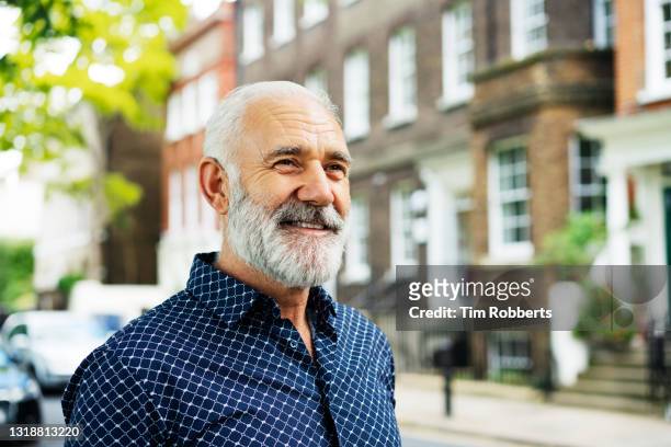portrait of man, smiling - mature men stock pictures, royalty-free photos & images