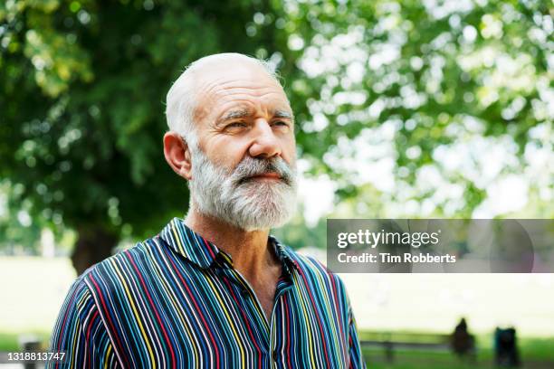 man looking up, outside, park - senior spirituality stock pictures, royalty-free photos & images