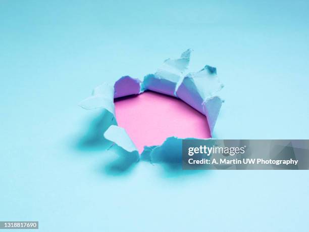 Exploding Through Paper Paper Explosion Photos and Premium High Res Pictures - Getty Images
