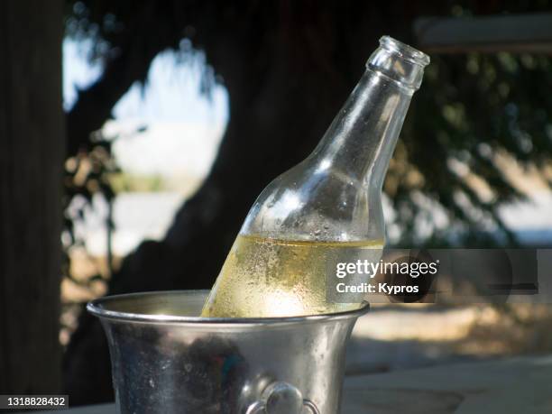 bottle of white wine at the beach - bottle condensation stock pictures, royalty-free photos & images