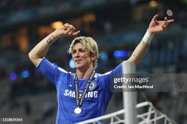 Fernando Torres of Chelsea celebrates on top of the goals after this teams victory in the UEFA Champions League Final between FC Bayern Muenchen and...