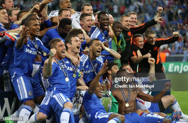 Didier Drogba and Chelsea team mates celebrate with the trophy during UEFA Champions League Final between FC Bayern Muenchen and Chelsea at the...