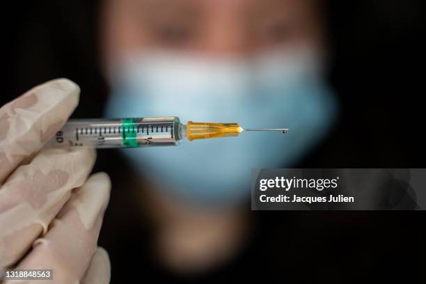 syringe for vaccination - france coronavirus stock pictures, royalty-free photos & images