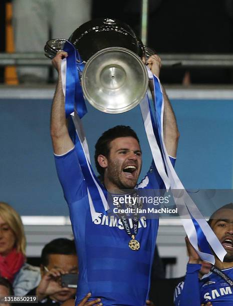 Juan Mata of Chelsea celebrates with the trophy during UEFA Champions League Final between FC Bayern Muenchen and Chelsea at the Fussball Arena...