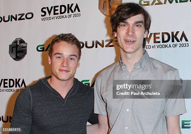 Actor Brando Eaton and Marston Hefner arrive at the E3 red carpet launch party at Suede in the Westin Bonaventure Hotel on June 7, 2011 in Los...