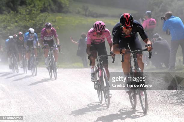 Egan Arley Bernal Gomez of Colombia Pink Leader Jersey & Filippo Ganna of Italy and Team INEOS Grenadiers passing through a gravel strokes sector...