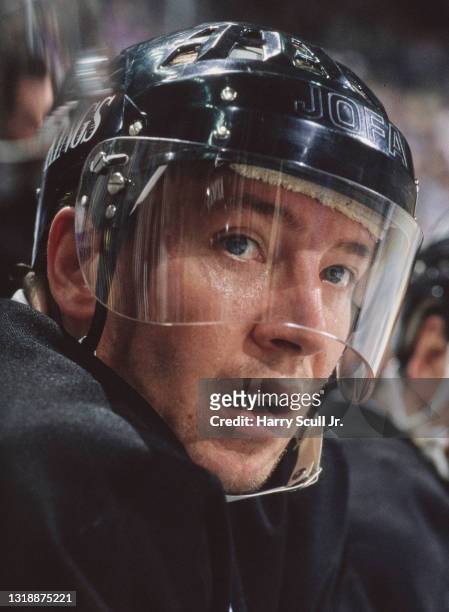 Jari Kurri, Right Wing for the Los Angeles Kings looks on from the bench during the NHL Prince of Wales Conference Adams Division game against the...