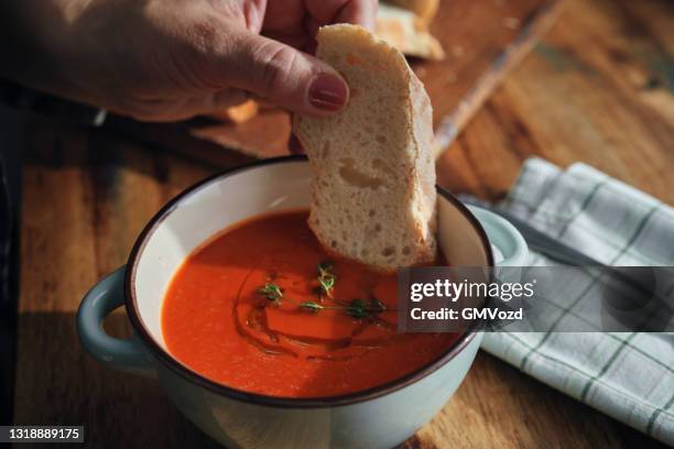 creamy tomato soup with olive oil and thyme - tomato soup stock pictures, royalty-free photos & images