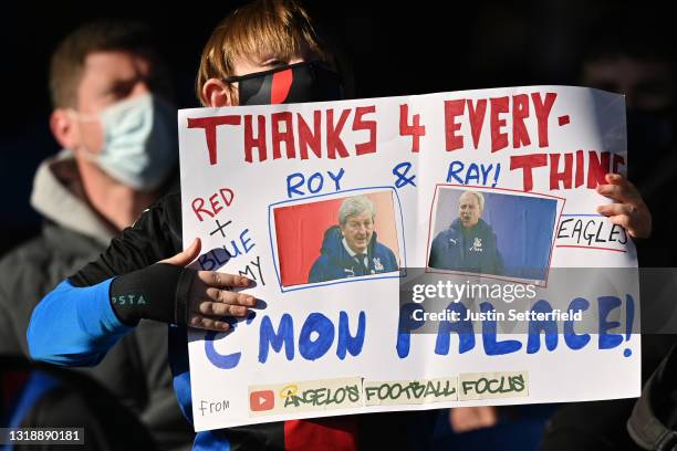 Crystal Palace fan holds a banner which reads 'Thanks 4 Everything Roy & Ray' prior to the Premier League match between Crystal Palace and Arsenal at...