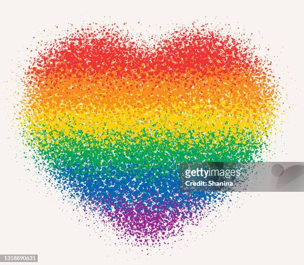 rainbow flag heart shape - grainy spray - gay pride parade stock illustrations