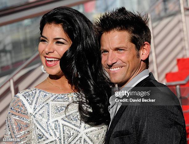 Miss USA 2010 Rima Fakih and singer Jeff Timmons of 98 Degrees attend the arrivial ceremony for the 2011 Miss USA contestants at the Planet Hollywood...