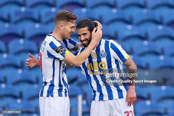 Toni Martinez of FC Porto celebrates with Sergio Oliveira after scoring their side's third goal during the Liga NOS match between FC Porto and...