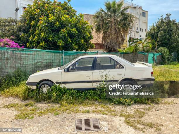 white peugeot car model 405 parked outdoors - vintage car stock pictures, royalty-free photos & images