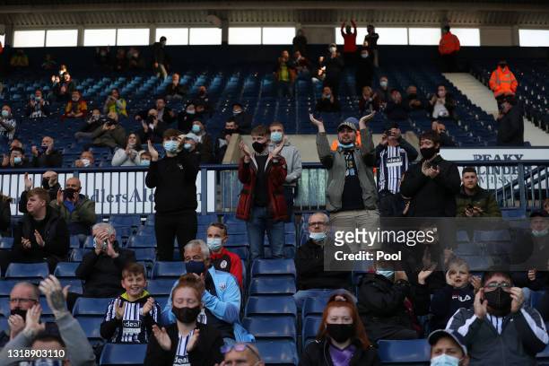 Fans of West Bromwich Albion interact from the crowd during the Premier League match between West Bromwich Albion and West Ham United at The...