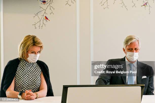 King Philippe of Belgium and Queen Mathilde visit the Jessa Hospital Salvator Campus on May 19, 2021 in Hasselt, Belgium. The Royal Couple meets with...