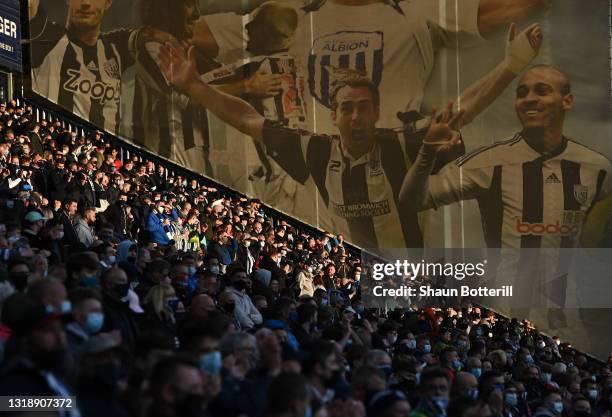 Fans of West Bromwich Albion look on from the stands during the Premier League match between West Bromwich Albion and West Ham United at The...