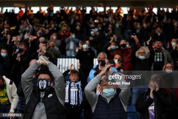 Fans of West Bromwich Albion look on from the stands during the Premier League match between West Bromwich Albion and West Ham United at The...