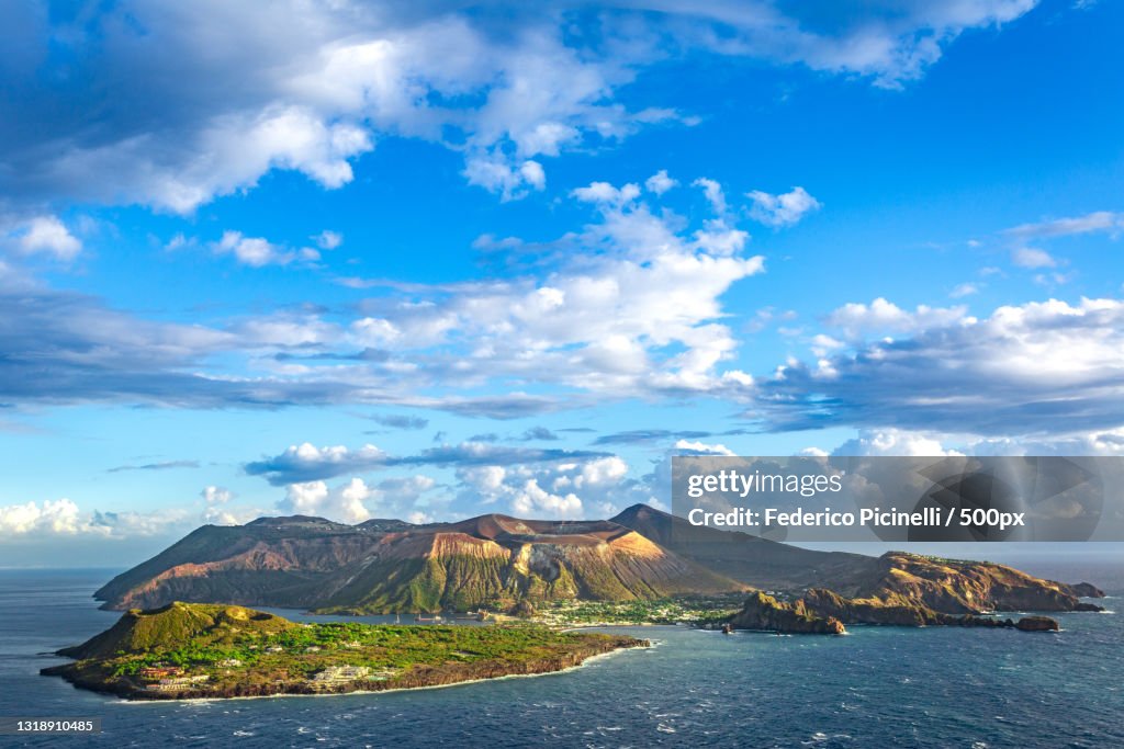 Scenic view of sea and mountains against sky,Lipari,Messina,Italy