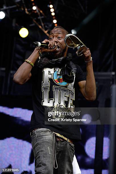 Rapper performs with Jessy Matador on stage during the 'Nuit Africaine' concert at Stade de France on June 11, 2011 in Paris, France.