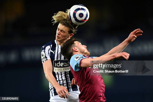 Declan Rice of West Ham United competes for a header with Conor Gallagher of West Bromwich Albion during the Premier League match between West...
