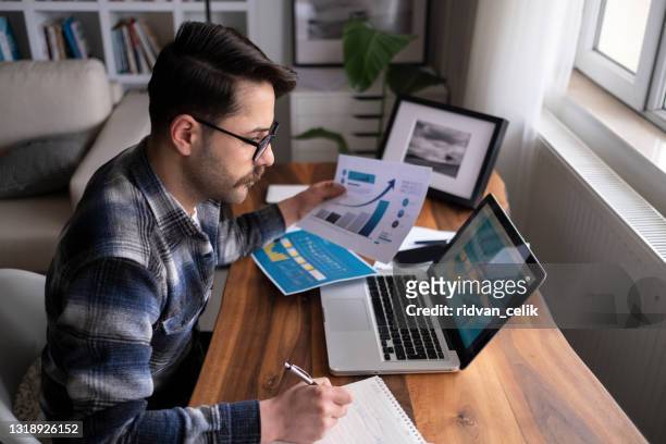 businessman working on financial report of corporate operations, balance - cash flow stock pictures, royalty-free photos & images