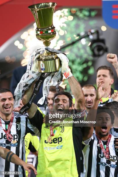 Gianluigi Buffon of Juventus celebrates with the trophy following the 2-1 victory in the TIMVISION Cup Final between Atalanta BC and Juventus at...