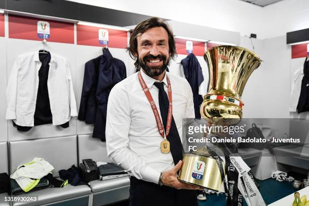 Head coach of Juventus Andrea Pirlo celebrates in the dressing room the winning of the Italian Cup after the TIMVISION Cup Final between Atalanta BC...
