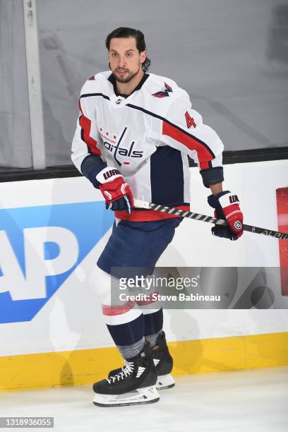 Brenden Dillon of the Washington Capitals warms up before the game against the Boston Bruins in Game Three of the First Round of the 2021 Stanley Cup...