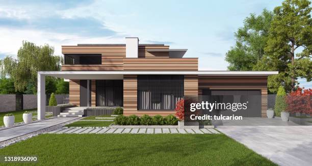 modern luxurious villa with wooden long planks with beautiful garden. - modern garage stock pictures, royalty-free photos & images