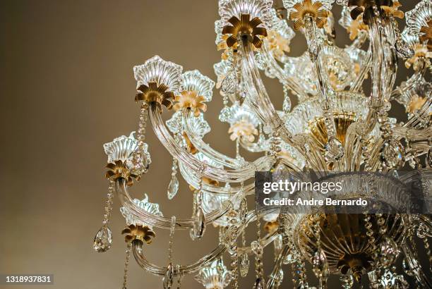 golden crystal chandelier - crystal chandelier stock pictures, royalty-free photos & images