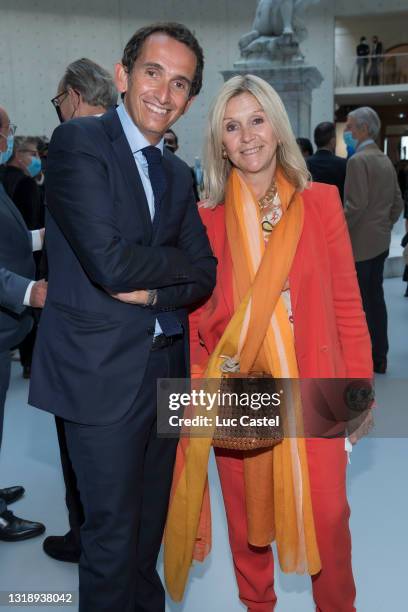 Alexandre Bompard and Anne Meaux attend the " Bourse de Commerce - Pinault Collection, Modern Art Foundation " Opening Night on May 19, 2021 in...