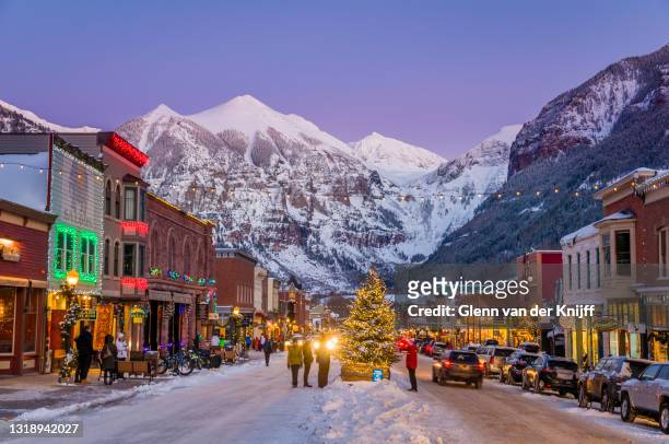 twilight in the main street of telluride on a very cold winter evening - telluride stock pictures, royalty-free photos & images