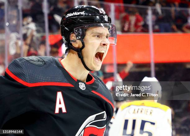 Sebastian Aho of the Carolina Hurricanes celebrates following a goal scored during the first period in Game Two of the First Round of the 2021...