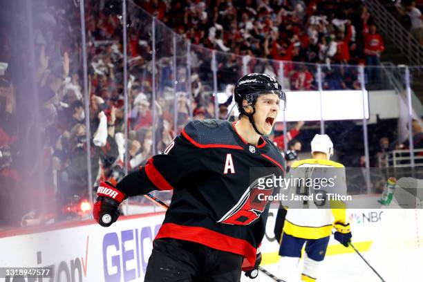 Sebastian Aho of the Carolina Hurricanes celebrates following a goal scored during the first period in Game Two of the First Round of the 2021...