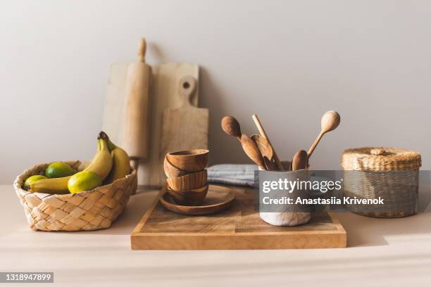 kitchen utensils on home beige background. - kitchen bench wood stock pictures, royalty-free photos & images