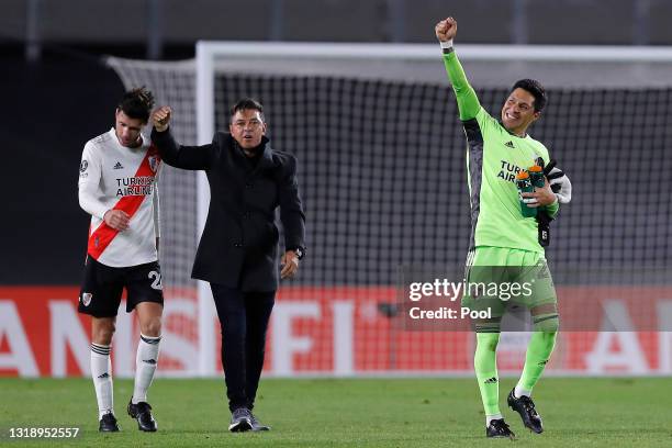 Enzo Pérez goalkeeper of River Plate and his coach Marcelo Gallardo celebrate after winning a match between River Plate and Independiente Santa Fe as...