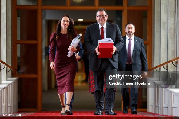 Prime Minister Jacinda Ardern and Finance Minister Grant Robertson make their way to the house during budget day 2021 at Parliament on May 20, 2021...