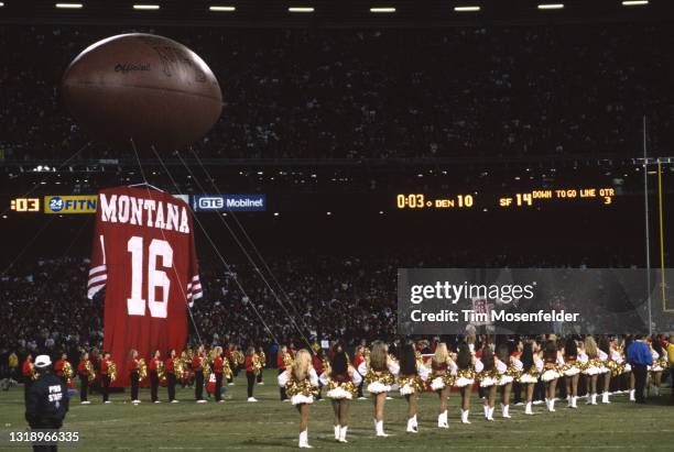 Joe Montana and Bill Walsh attend Joe Montana day at Candlestick Park on March 16, 1997 in San Francisco, California.