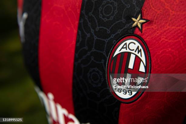 The AC Milan home shirt displaying the club badge on May 19, 2021 in Manchester, United Kingdom.