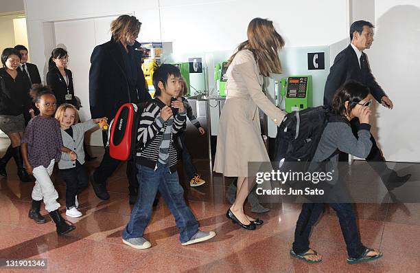 Brad Pitt, Angelina Jolie and their six children Maddox, Pax, Zahara, Shiloh, Knox, and Vivienne arrive at Haneda International Airport on November 8...