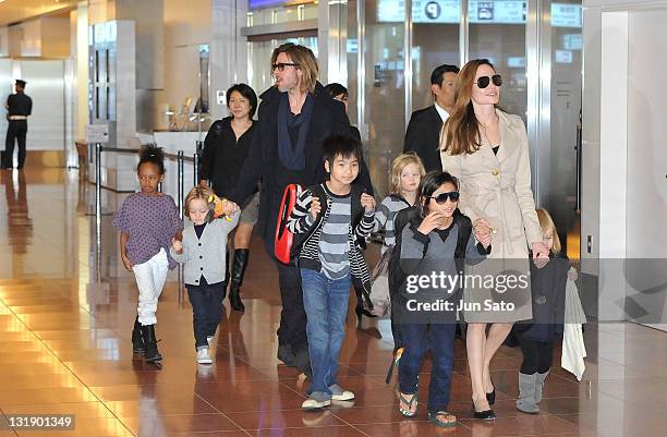 Brad Pitt, Angelina Jolie and their six children Maddox, Pax, Zahara, Shiloh, Knox, and Vivienne arrive at Haneda International Airport on November 8...