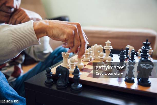 playing chess - chess defeat stock pictures, royalty-free photos & images