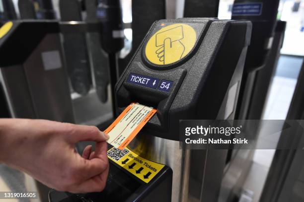 Train ticket is used at Stoke-on-Trent Train Station on May 20, 2021 in Stoke, England. The British government has created a state-owned body, Great...