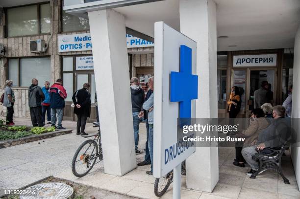 Employees of the Albena Black Sea resort wait in a queue to receive the COVID-19 vaccine on May 20, 2021 in Albena, Bulgaria. Bulgaria prepares for a...