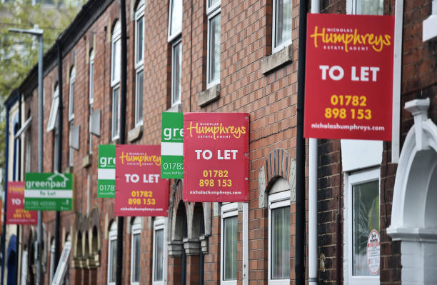 Placards from various estates agents advertising properties To Let are left outside house properties on May 20, 2021 in Stoke, England .
