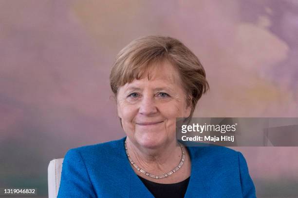 German Chancellor Angela Merkel sits as German President Frank-Walter Steinmeier confirms a yesterdays resignation of Families Minister Franziska...