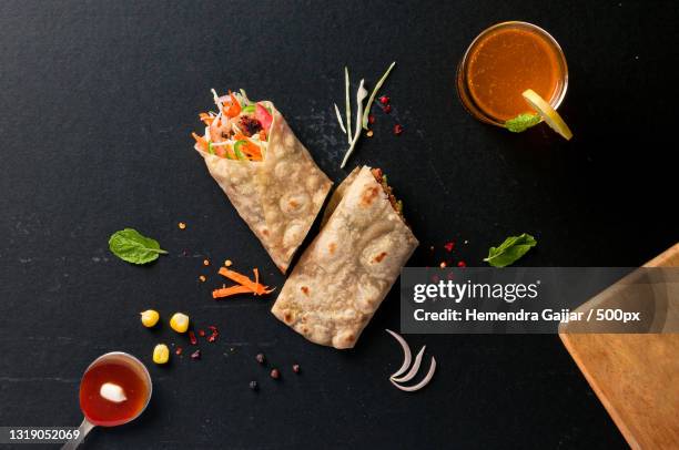 directly above shot of food on table,vadodara,gujarat,india - fajita stock pictures, royalty-free photos & images