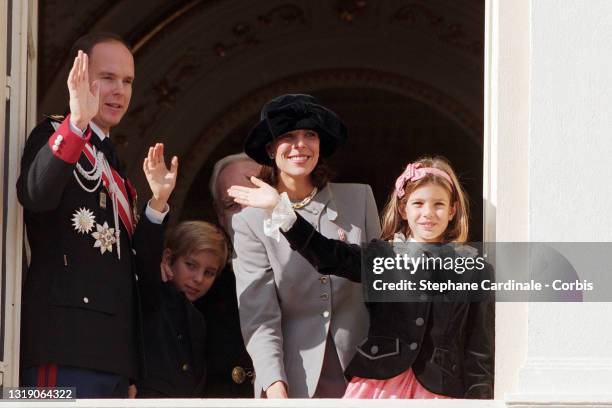 Prince Albert II of Monaco, Andrea Casiraghi, Princess Caroline of Monaco and Charlotte Casiraghi pose at the Palace balcony during the Monaco...